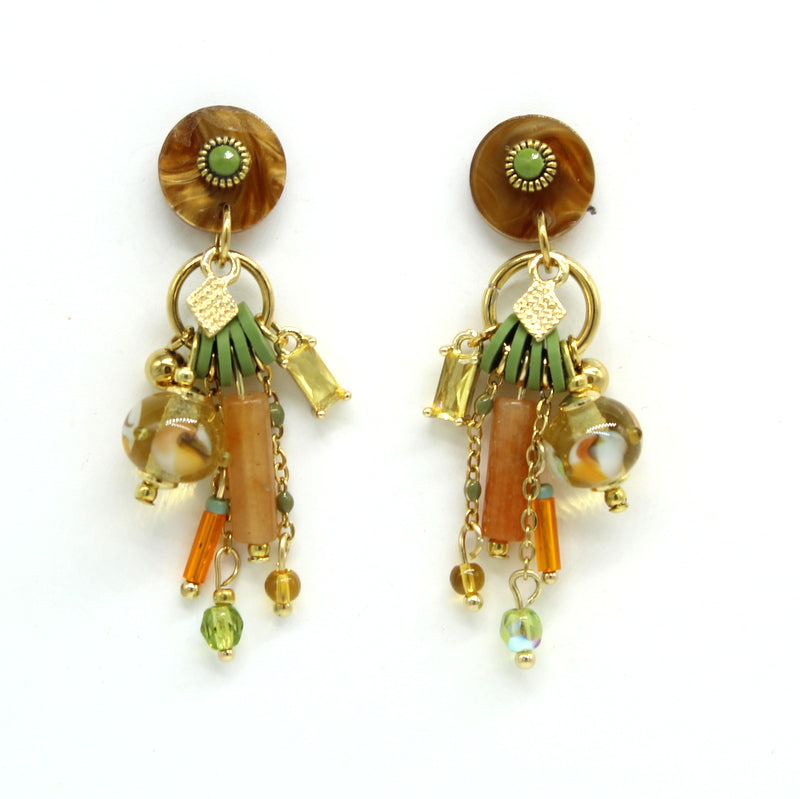 Boucles d'oreilles Salvia en acier doré avec support en résine, cascade de chaînes, pampilles et perle en verre de Murano topaz.