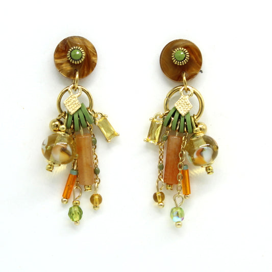 Boucles d'oreilles Salvia en acier doré avec support en résine, cascade de chaînes, pampilles et perle en verre de Murano topaz.