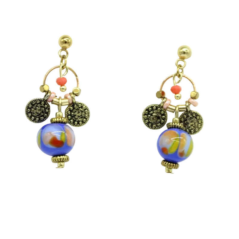 boucles d'oreilles pampilles perle verre de Murano bleue breloques dorées perles corail collection Sillage