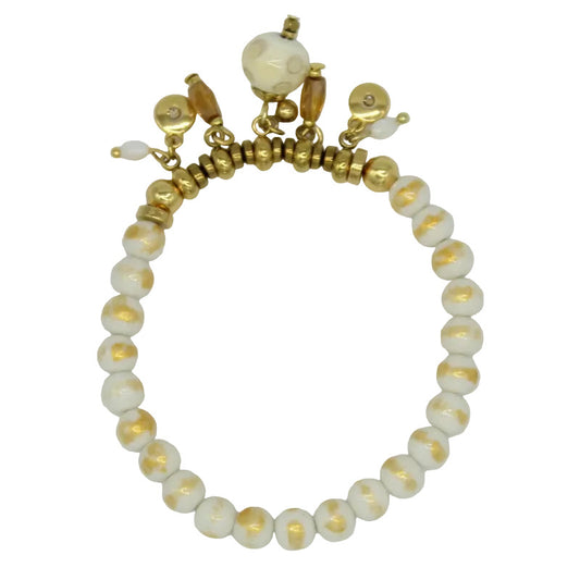 Bracelet strech boule blanche pampilles acier doré nacre et murano ivoire
