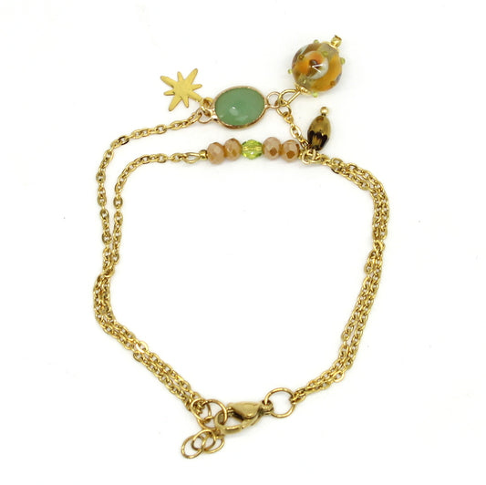 Bracelet double Salvia en acier doré avec perle en verre de Murano et breloques.