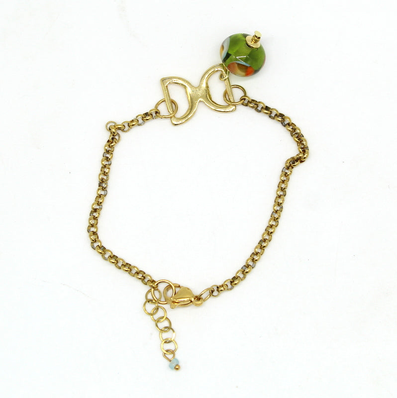 Bracelet Salvia en chaîne d'acier doré avec motif fer à cheval et perle en verre de Murano olive.