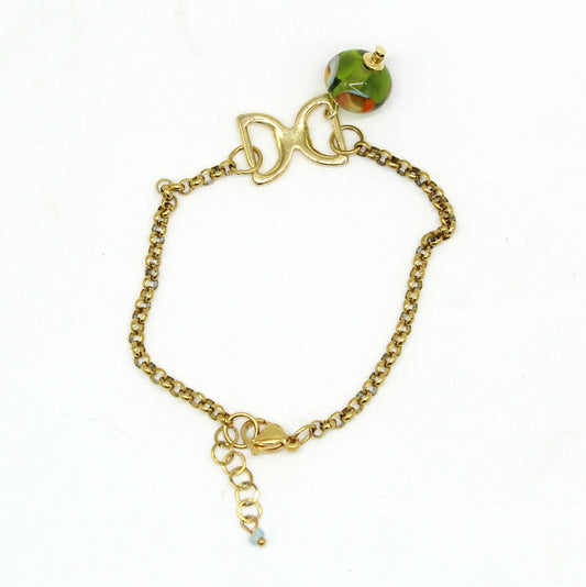 Bracelet Salvia en chaîne d'acier doré avec motif fer à cheval et perle en verre de Murano olive.