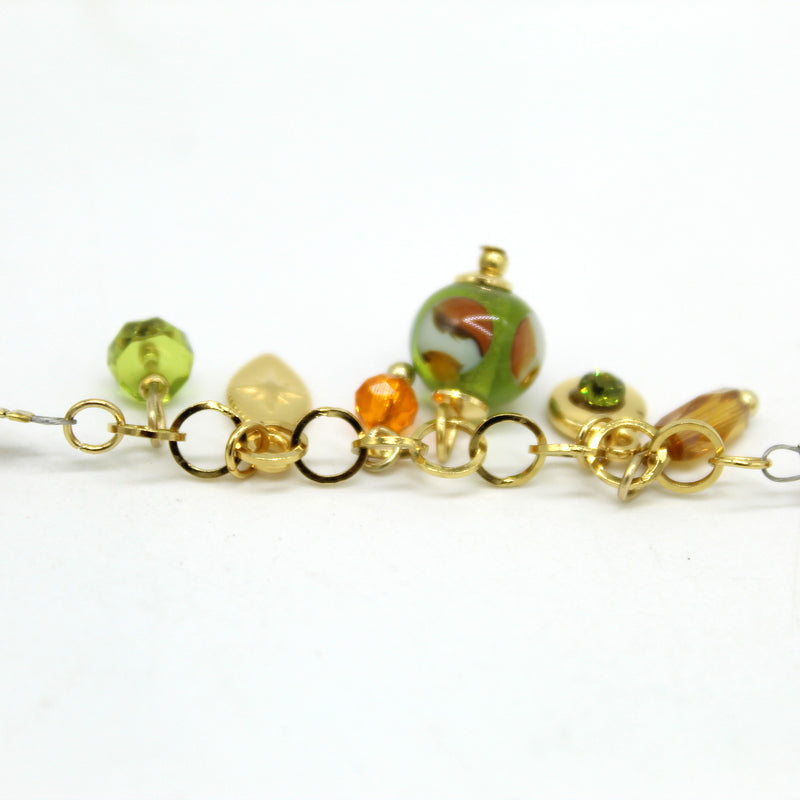 Bracelet Salvia avec perles boules, pampilles pendantes et perle centrale en verre de Murano.